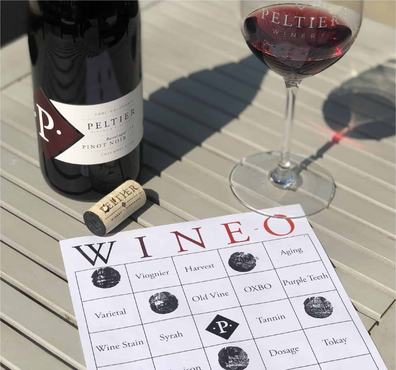 WINE-O Bingo card, bottle of wine and glass of red wine