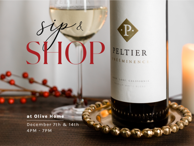Sip & Shop at Olive Home, bottle of wine with white label on gold tray and glass of white wine